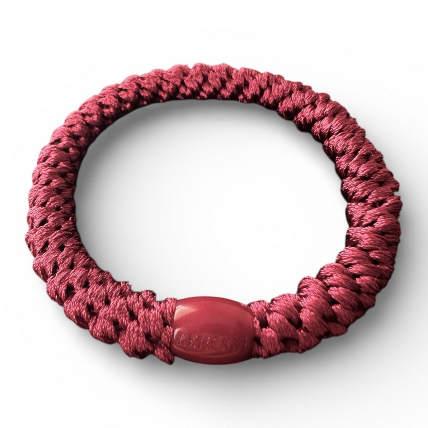 Slanted view of KKNEKKI Burgundy hair tie elastic