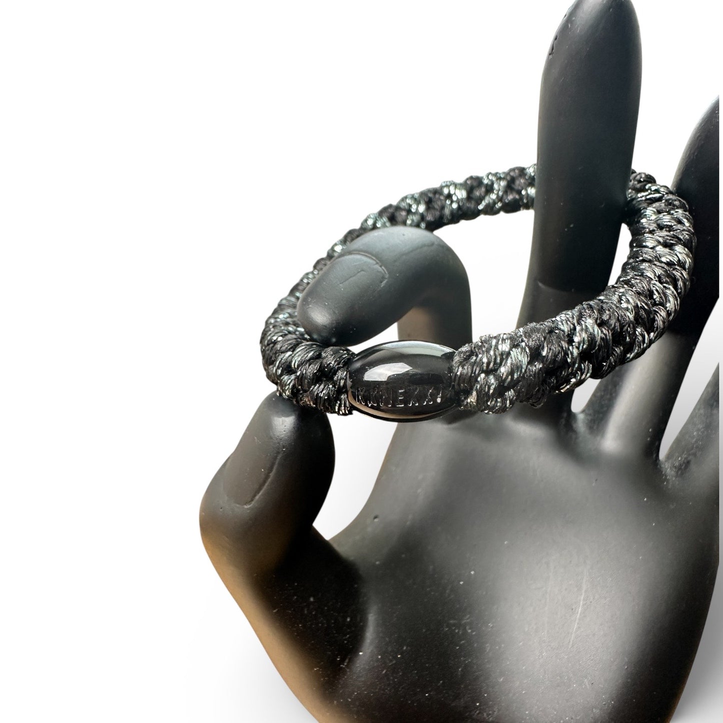 KKNEKKI Black & Silver Dark hair tie elastic on model hand