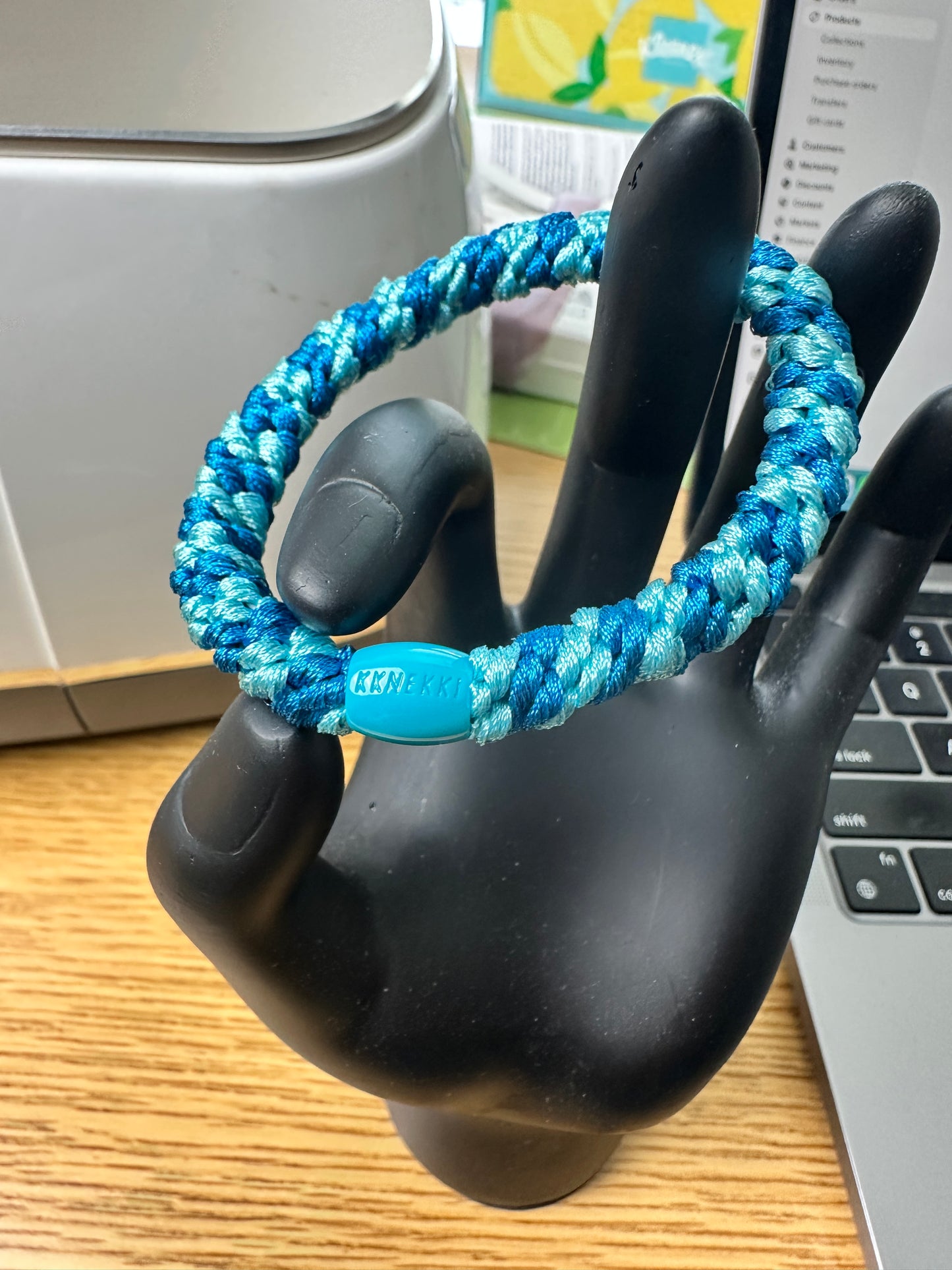 KKNEKKI Blue Light & Dark hair elastic ties on hand model