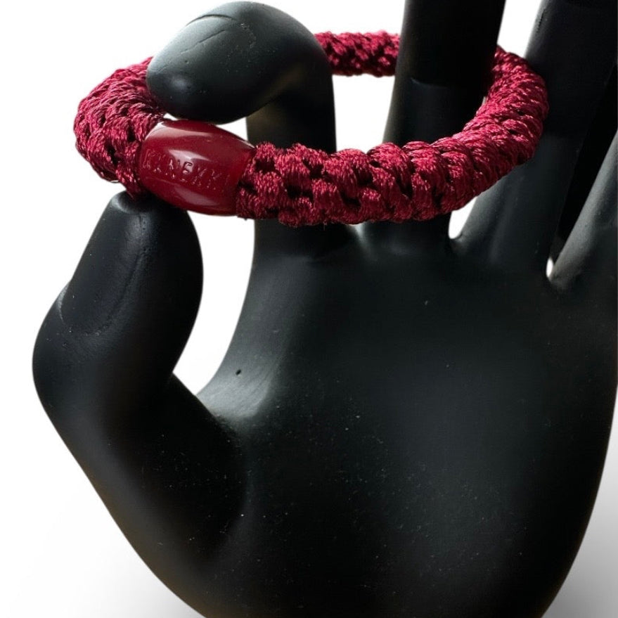 KKNEKKI Burgundy hair tie elastic on model hand
