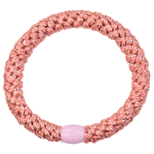 KKNEKKI Coral Glitter hair elastic on white background with branded bead 