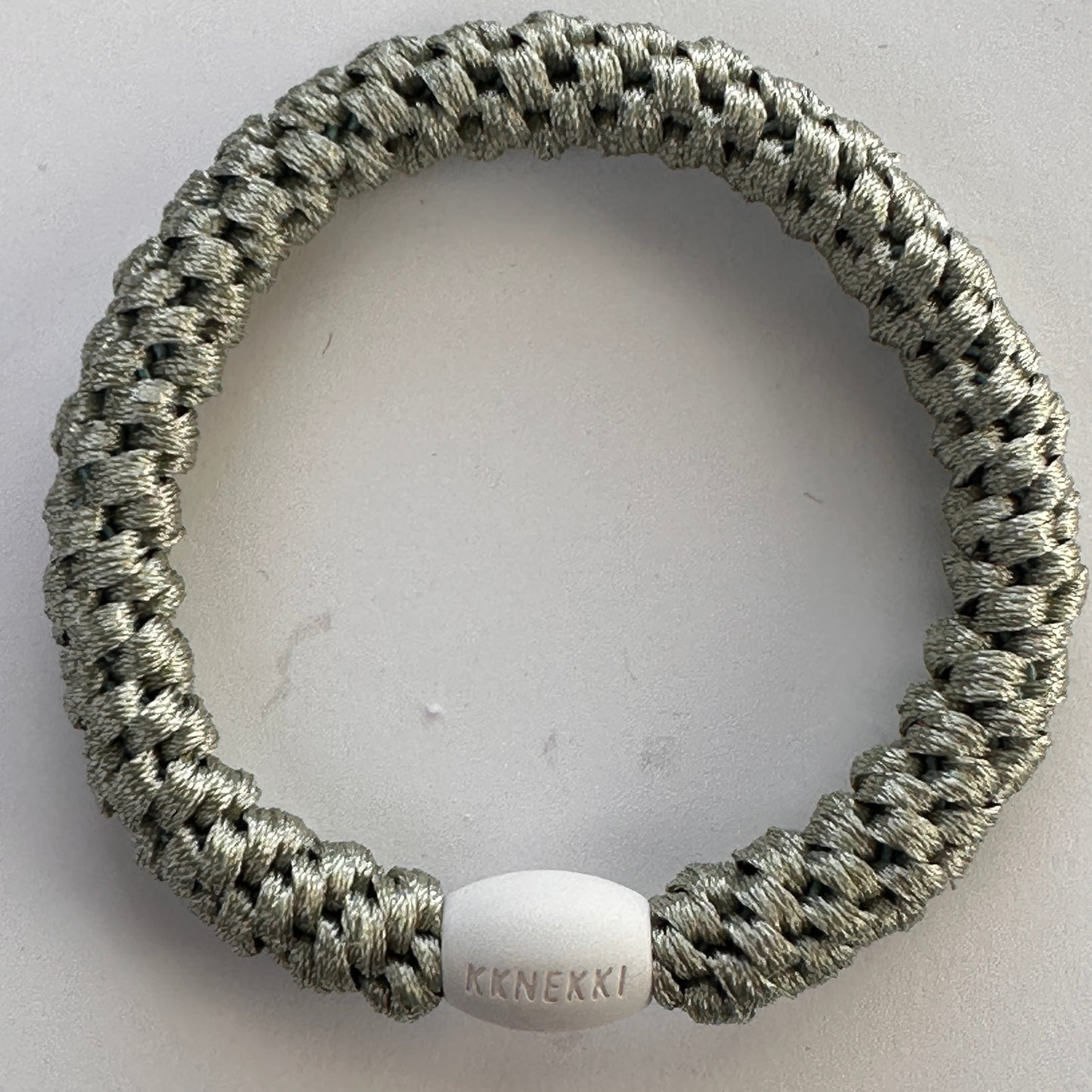 KKNEKKI Dusty Lind Green hair elastic 
on a white background
