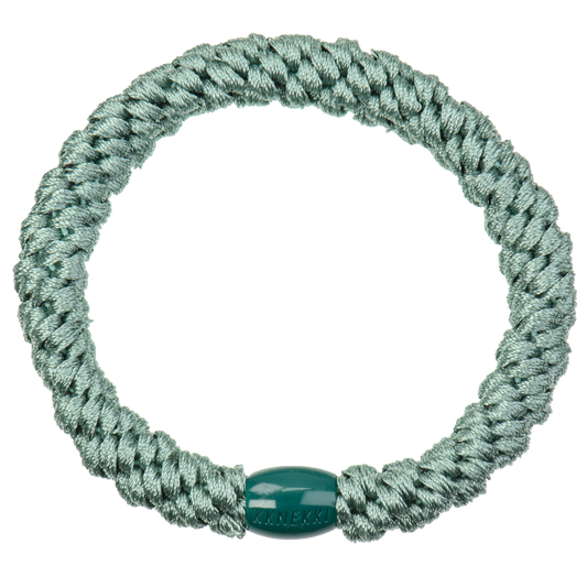 KKNEKKI Faded Green hair elastic on white background with branded bead visible