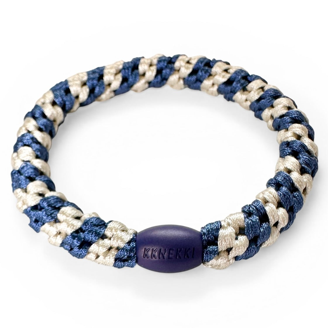 KKNEKKI Indigo Ivory Stripe hair tie  from the side with Branded bead visible on white background
