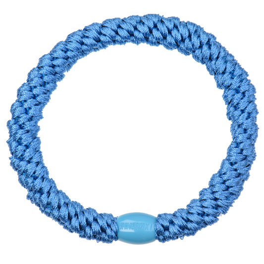 KKNEKKI Lake Blue hair elastic on white background with branded bead visible