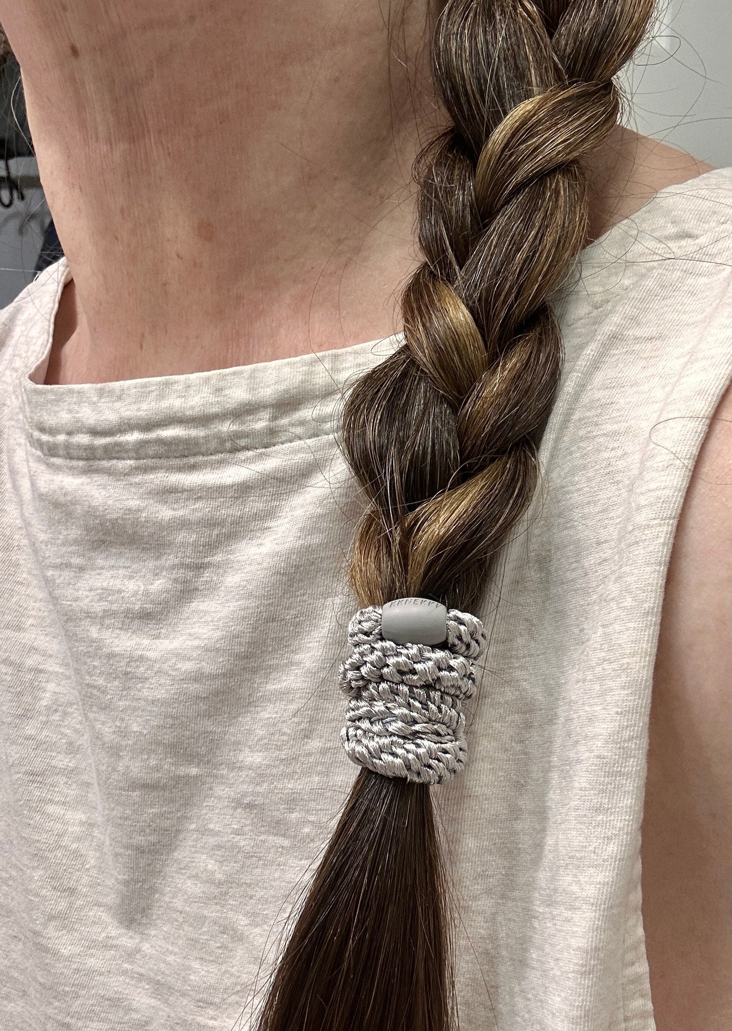 KKNEKKI Linen hair elastic on braided hair against linen top