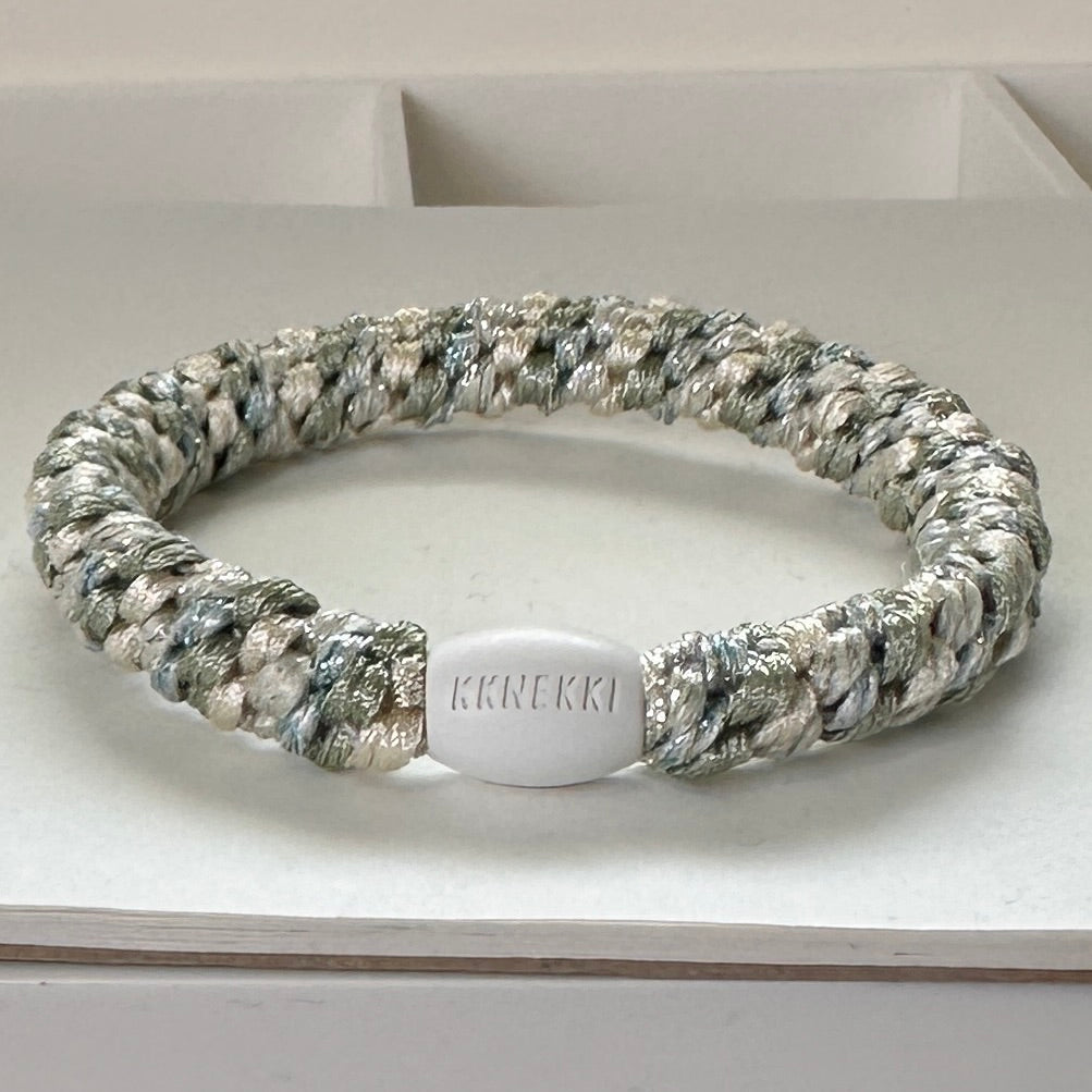KKNEKKI Mix Ivory Glitter Dusty Lind Green hair tie from side on white box