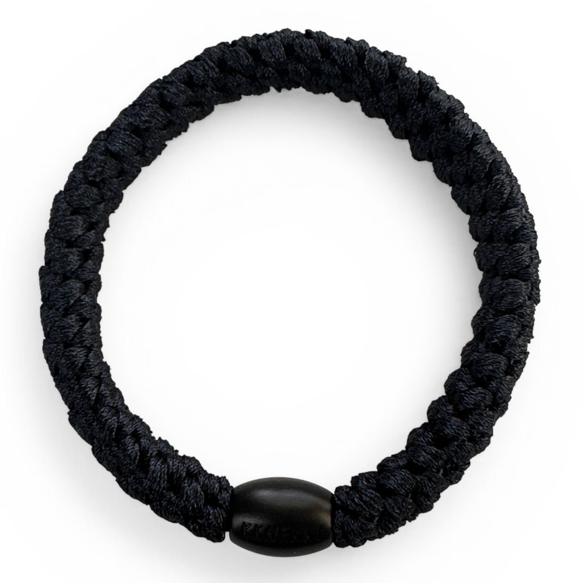 KKNEKKI Old Navy hair elastic photographed from above on white background