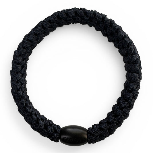 KKNEKKI Old Navy hair elastic photographed from above on white background