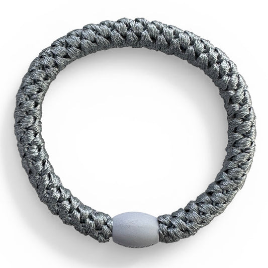 KKNEKKI Sea Blue hair elastic with white background shot straight down from above